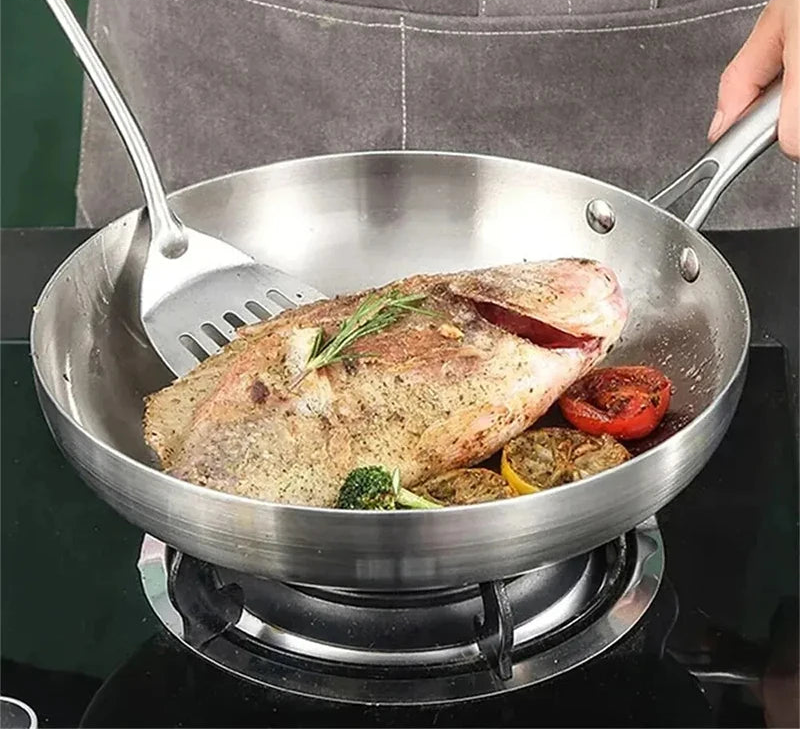 Poêle en acier inox argentée -