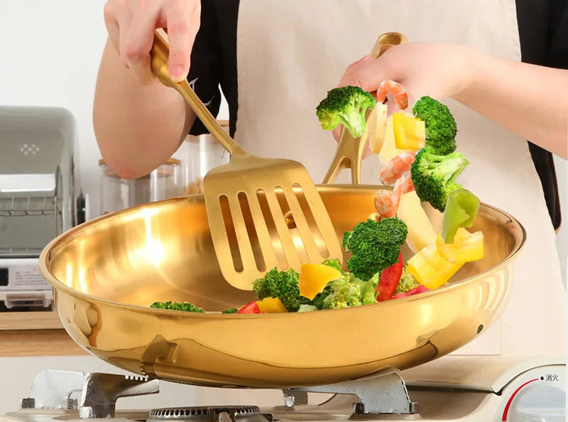 Poêle inox haut de gamme doré -