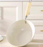 Poêle céramique bois au niveau du poignée -