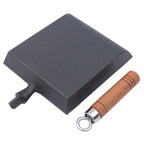 Poêle en fonte en forme de pelle -