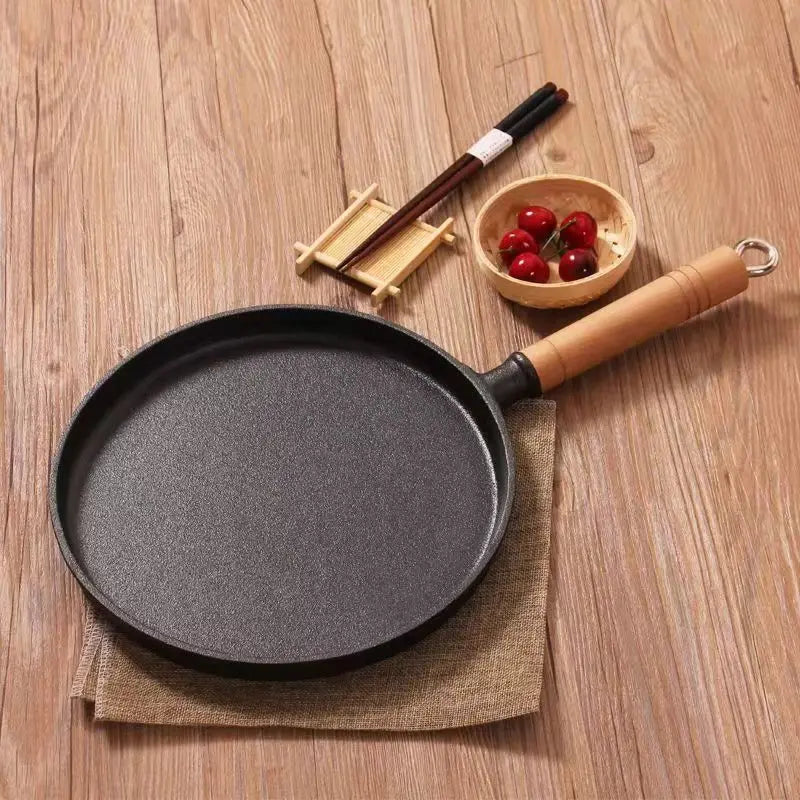 Poêle en fonte en forme de plaque de cuisson -
