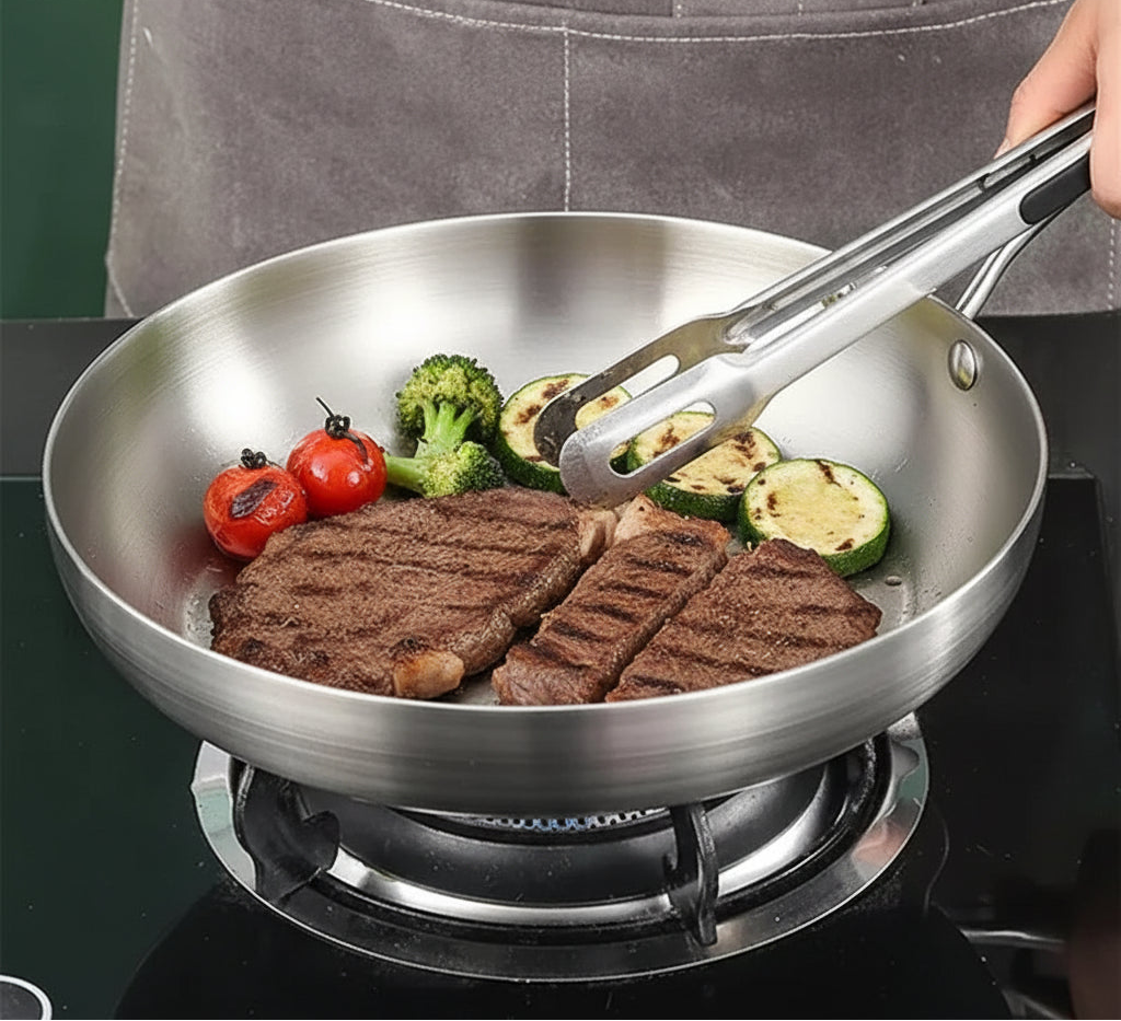 Poêle en acier inox argentée -