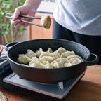 Poêle en fonte ronde noir -