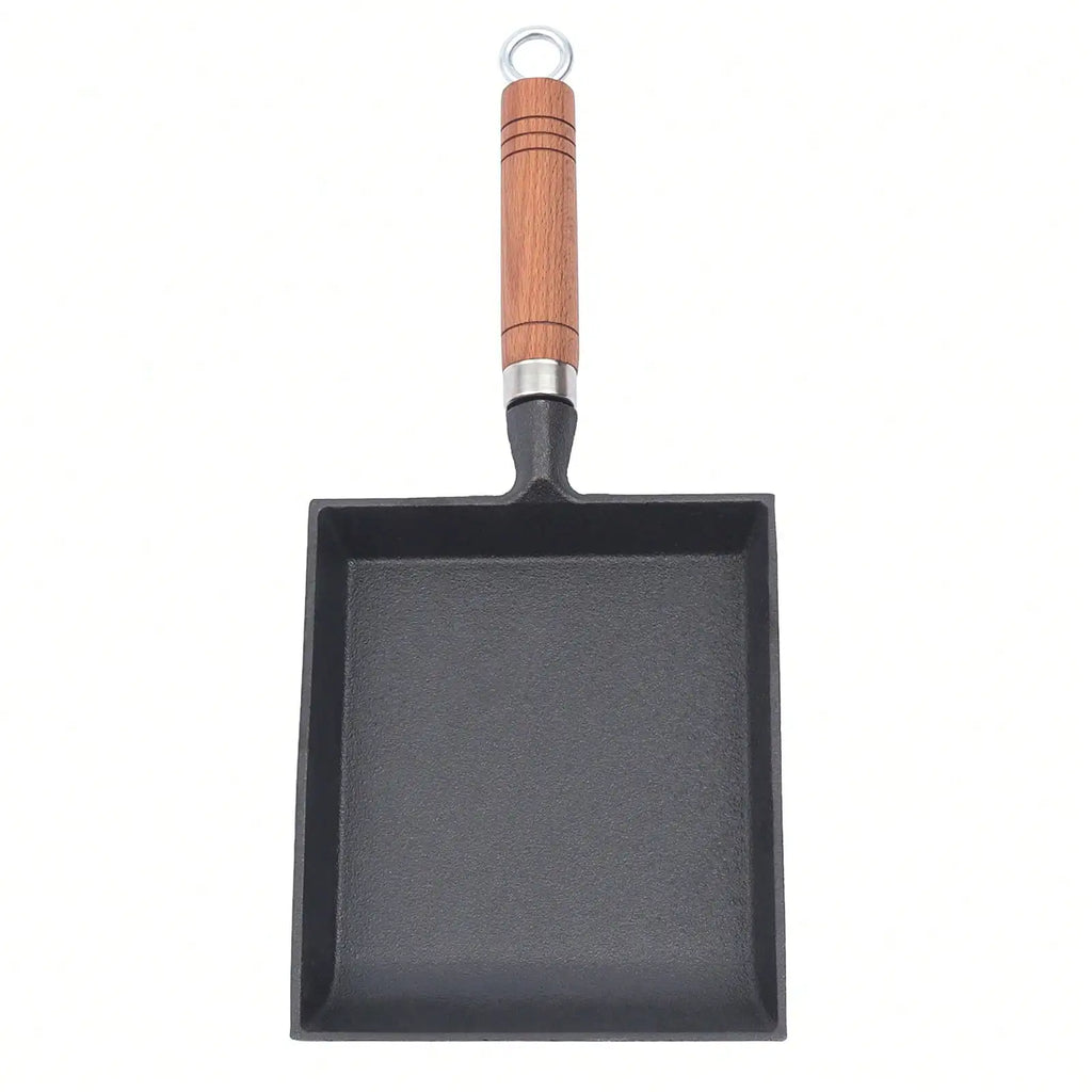 Poêle en fonte en forme de pelle -