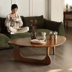 Table basse bois ronde de style triangulaire -